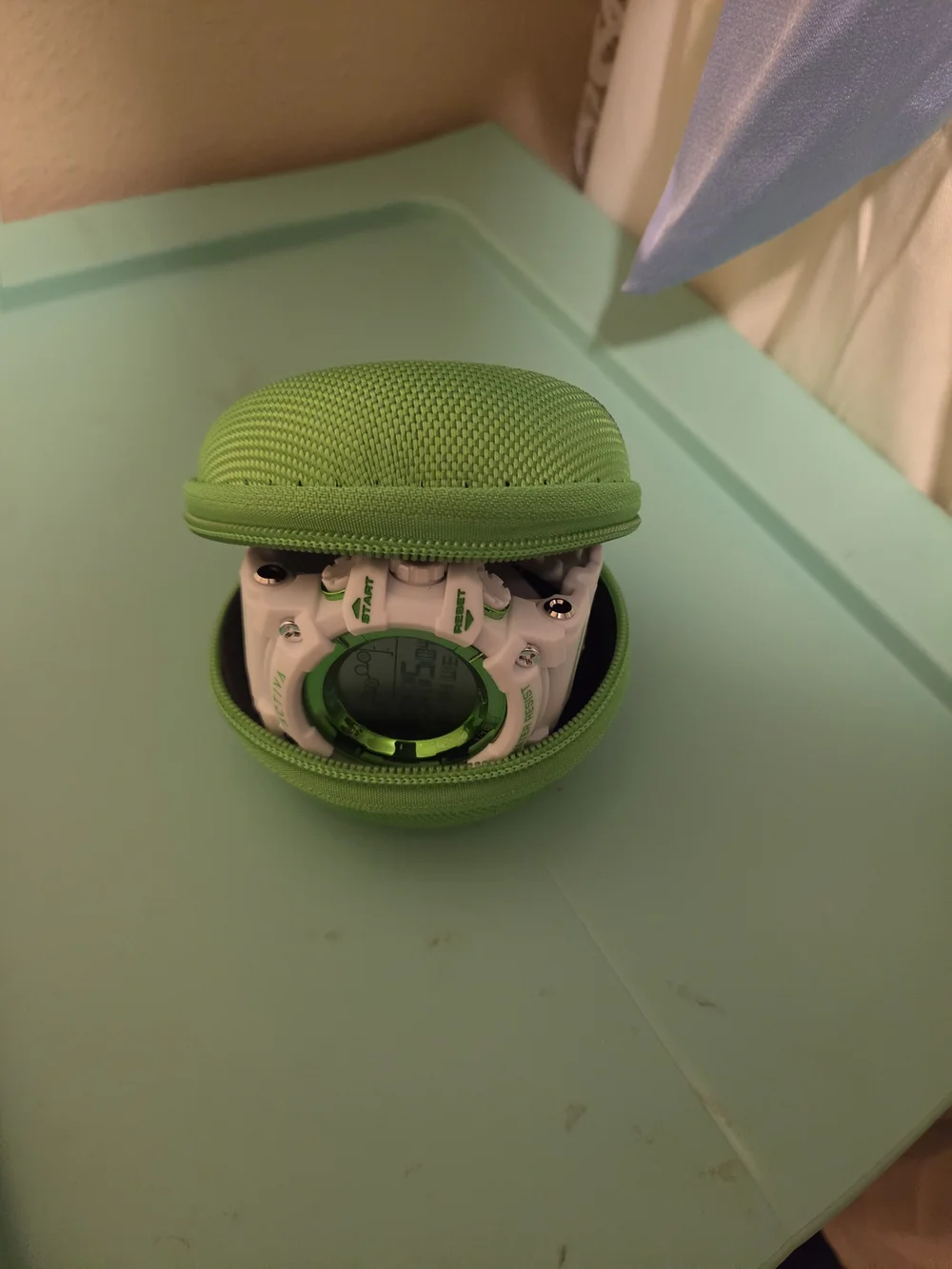Ativa White and Green Sport Digital Watch with LCD with a matching Invicta Case